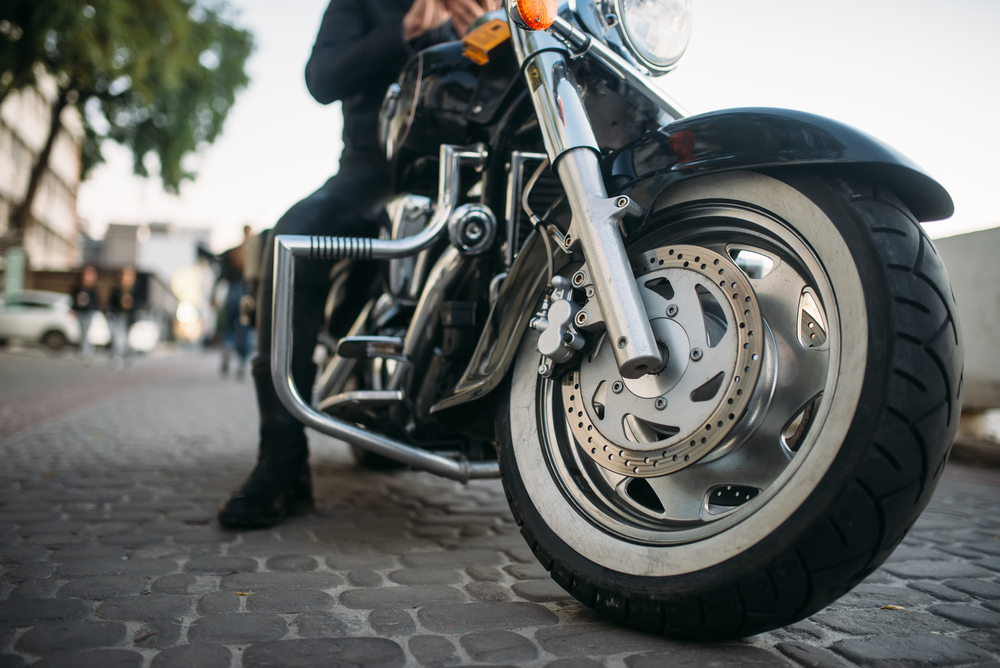 Biker Poses On Motorcycle Front View From Ground 2023 11 27 05 22 10 Utc